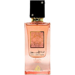Lattafa Ana Abiyedh Coral Eau De Parfum 60ml bottle front view showing pink liquid and elegant cap design.