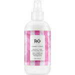 R+Co Candy Stripe Protect and Prep Detangling Spray front view bottle on white background