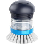 MR.SIGA Soap Dispensing Palm Brush front view showcasing the navy blue top button and clear soap reservoir.