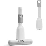 Miracle K Mini Mop front view showing compact handle and sponge head for household cleaning.