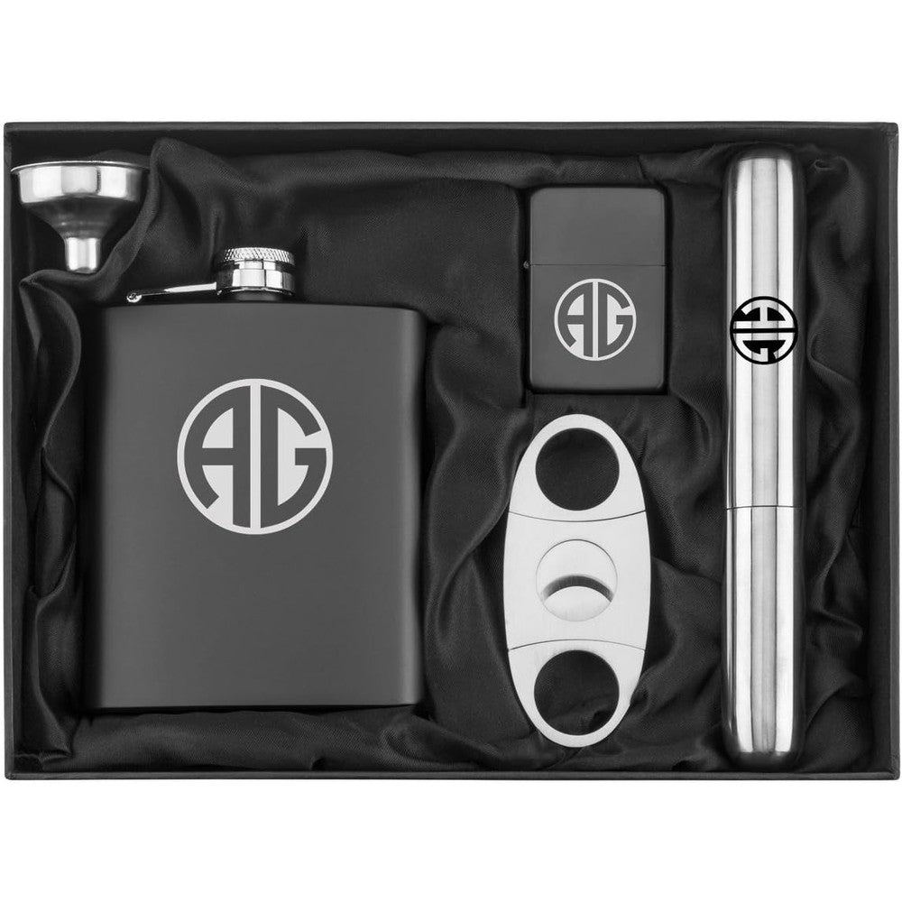 Daylor custom monogram engraved seven Ounce stainless steel flask gift set front view featuring matte black finish accessories in a silk-lined presentation box.