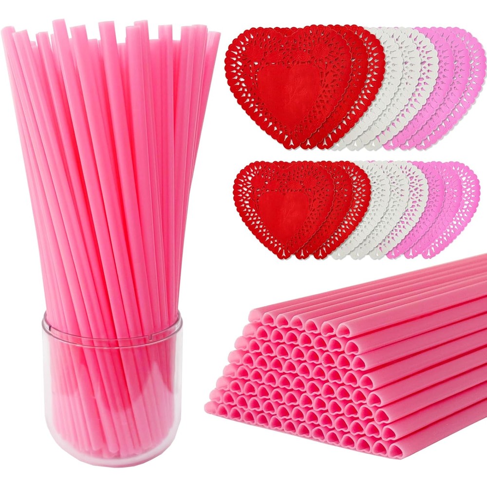 Unbranded pink heart shaped straws front view arranged on a decorated party table