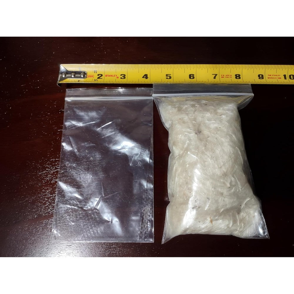Generic Stay Downwind milkweed seed floss front view authentic hunting wind indicator bag