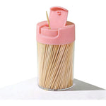 Wzrvmox natural bamboo toothpicks in blue and pink dispenser front view