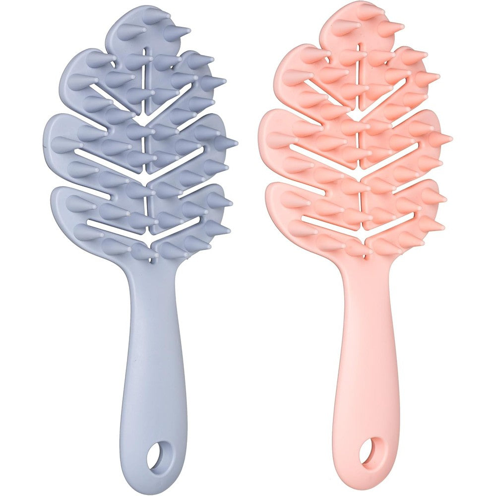 Kira Sylune scalp massager brush front view showing pastel blue leaf-grip handle.