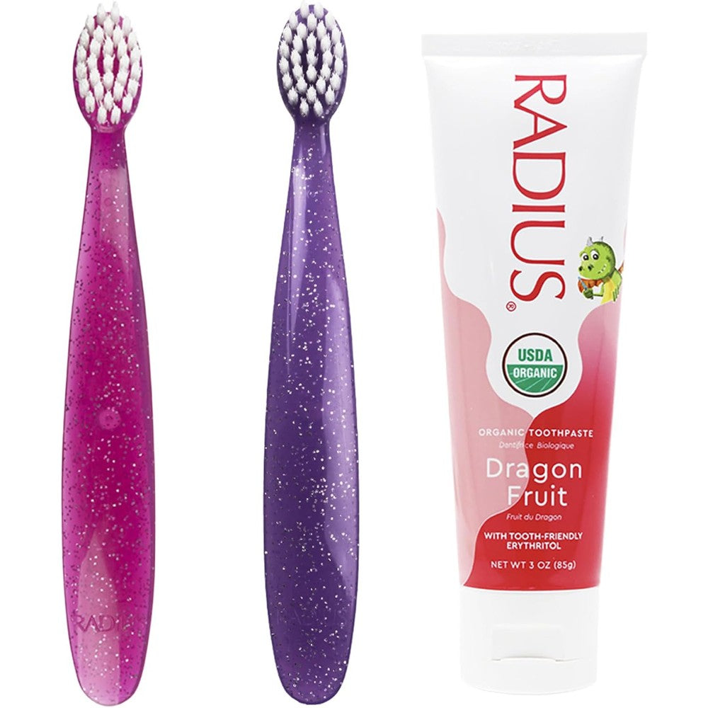 Radius Toddler Toothbrush and Toothpaste Bundle front view with pink and purple brushes.