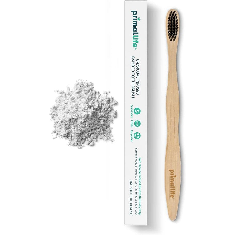 Primal Life Organics charcoal bamboo toothbrush front view for natural teeth whitening.