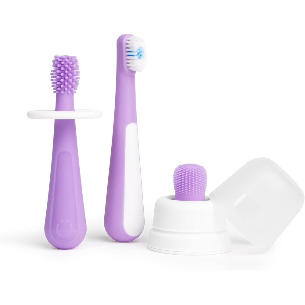 Ubbi Grow With Me Toothbrush Training Set front view purple baby oral care kit.