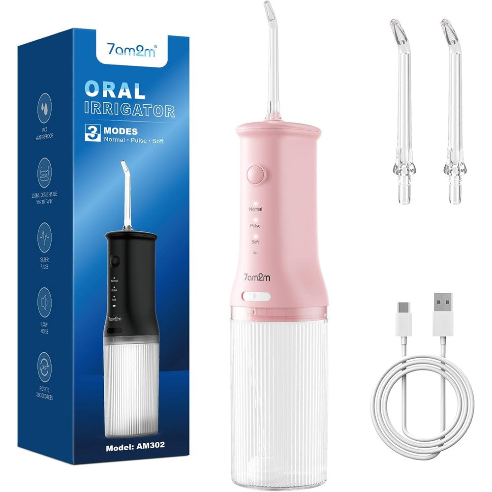 7AM2M portable cordless water flosser in pink showing front view controls