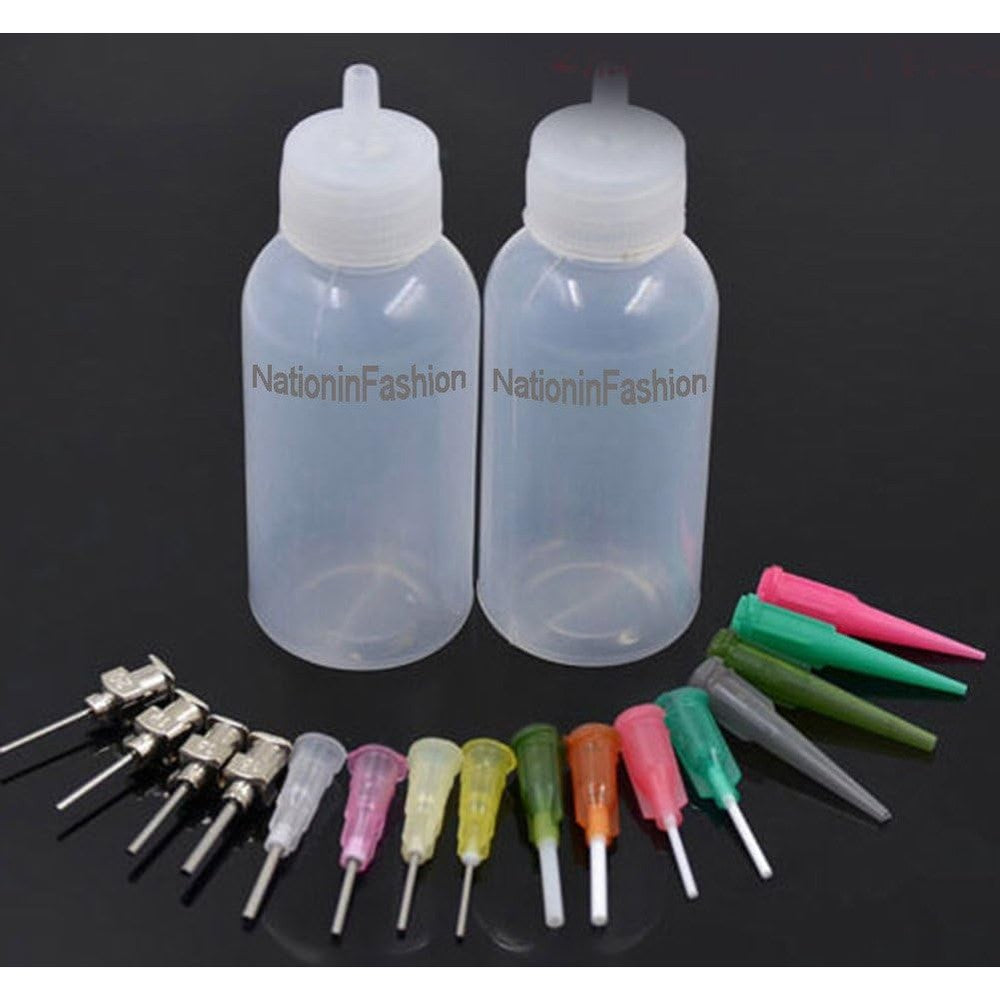 NationInFashion Henna Applicator Bottles front view featuring two white squeeze bottles and a variety of sixteen color-coded stainless steel precision needle tips.