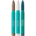 Thrive Causemetics Brilliant Eye Brightener Bundle for Brown Eyes front view showcasing three shadow sticks and confetti makeup bag.