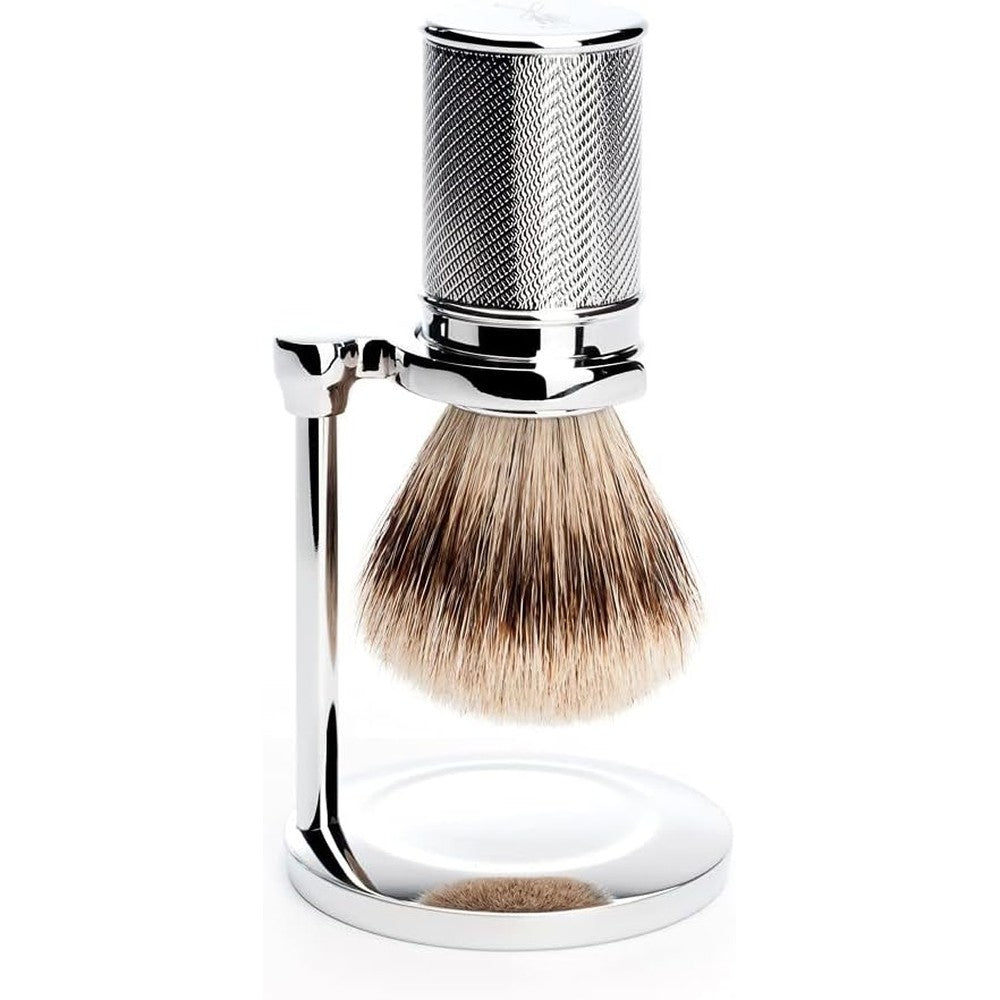 MÜHLE Chrome Sturdy Shaving Stand front view holding a TRADITIONAL series brush on a clean bathroom countertop