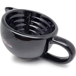 The Goodfellas' Smile Scuttle Shave Mug front view showing the premium black glossy ceramic finish and ergonomic handle.