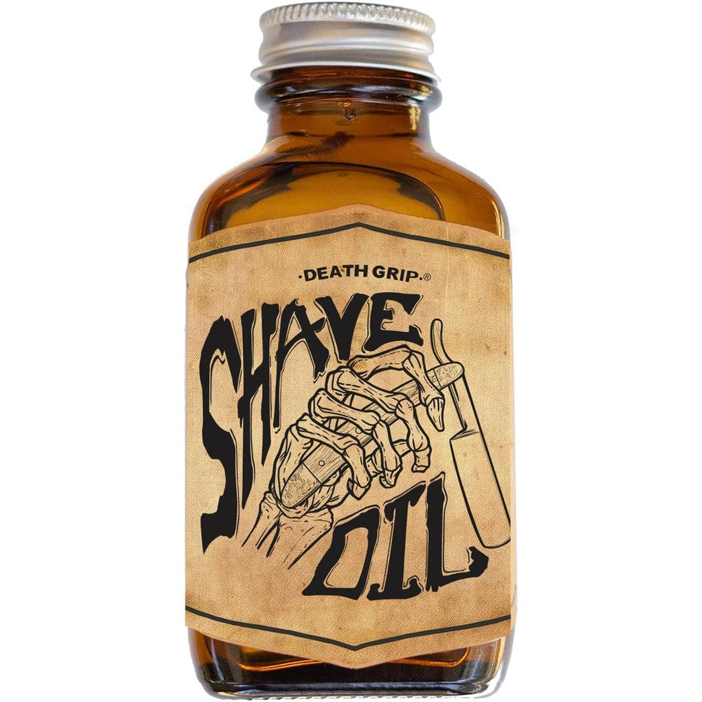 Death Grip Vintage Grooming Co Tea Tree Shave Oil front view of amber glass bottle with skull graphic