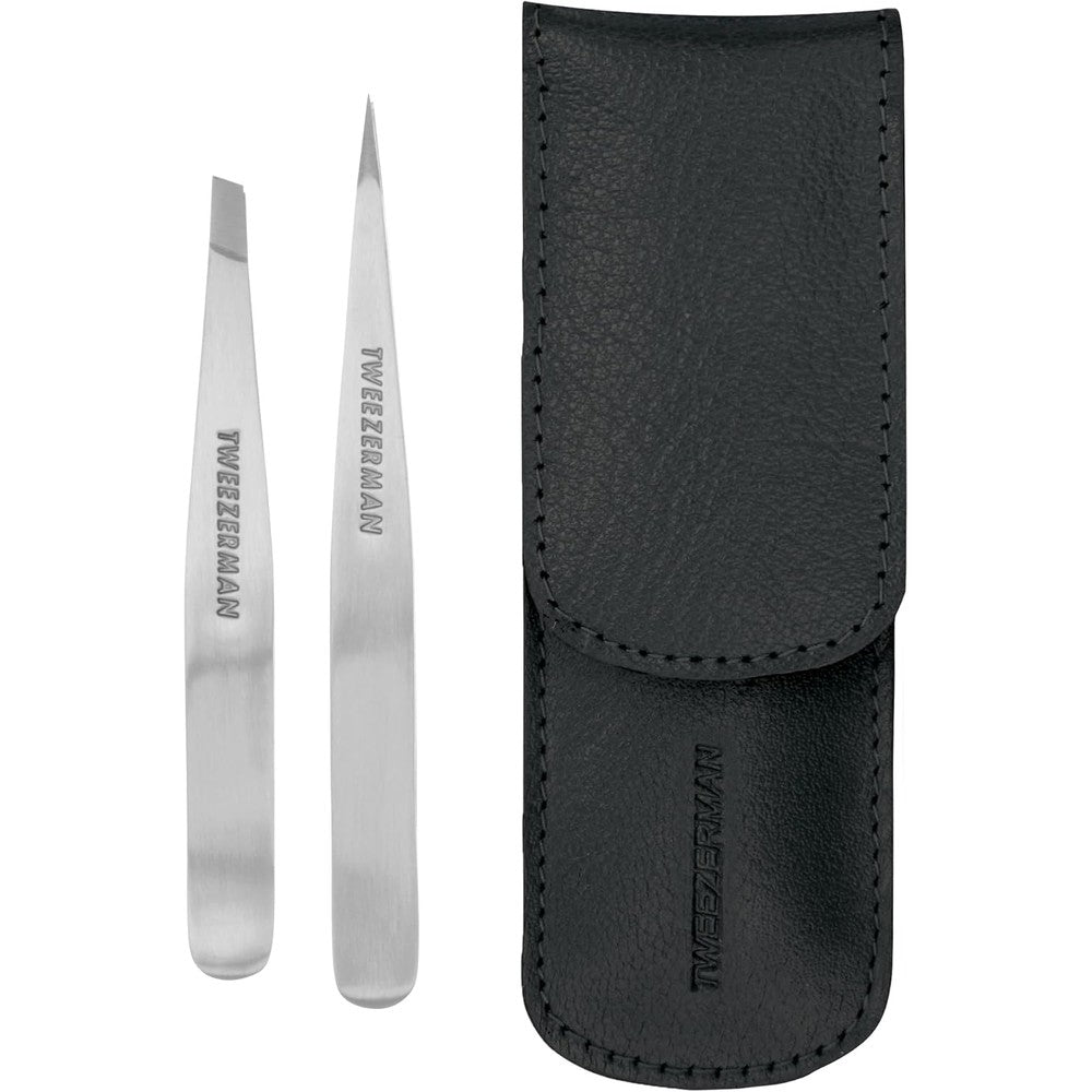 Tweezerman Petite Tweeze Set showing front view of slant and point tweezers next to black case