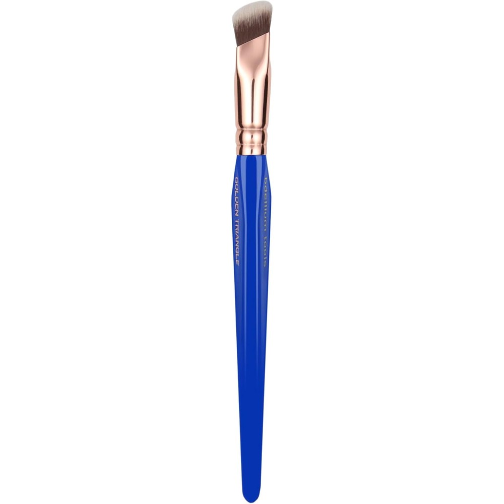Bdellium Tools Golden Triangle 935 Soft Square Concealer brush front view showing royal blue triangular handle and rose gold ferrule.