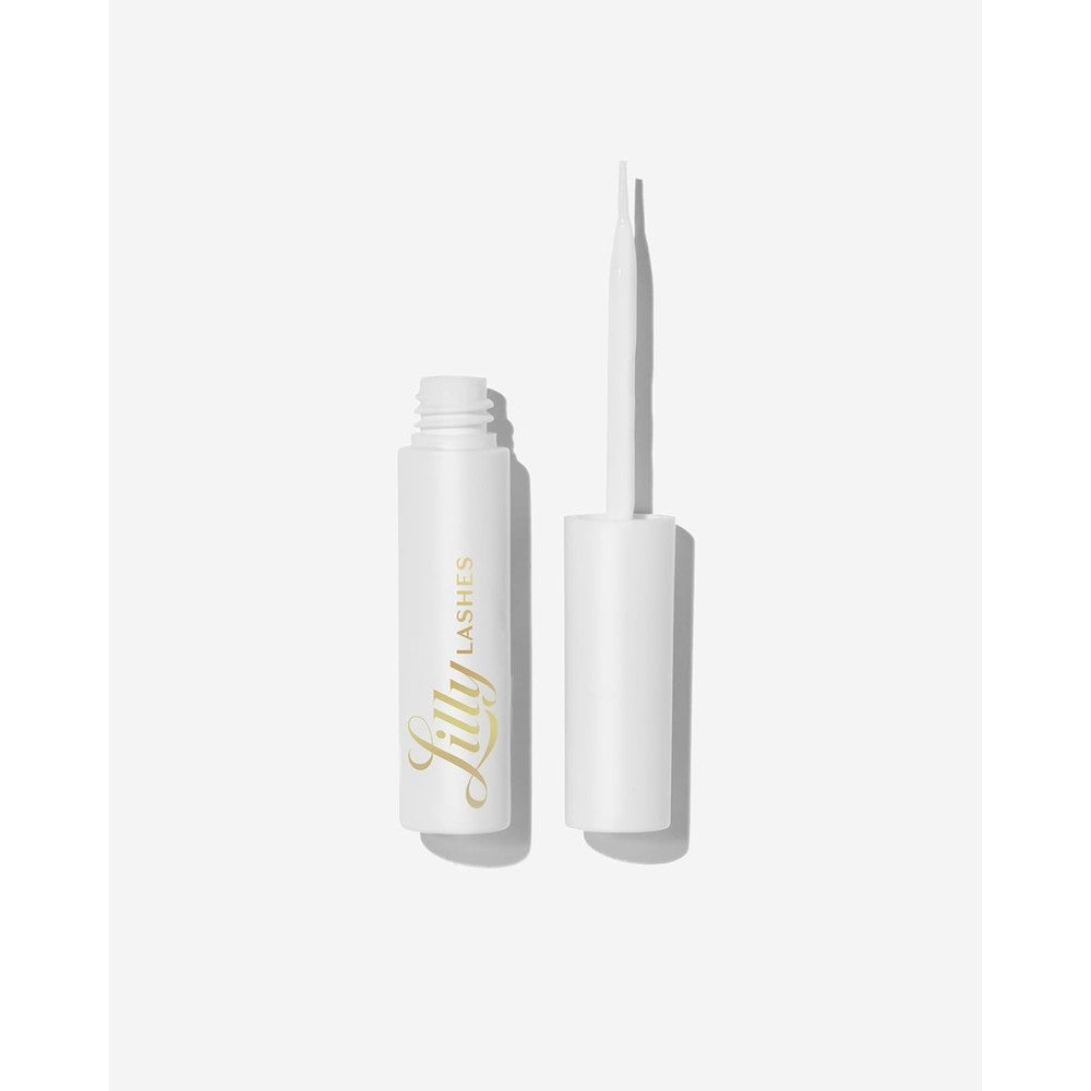 Lilly Lashes Clear Eyelash Glue front view showing precision brush applicator wand