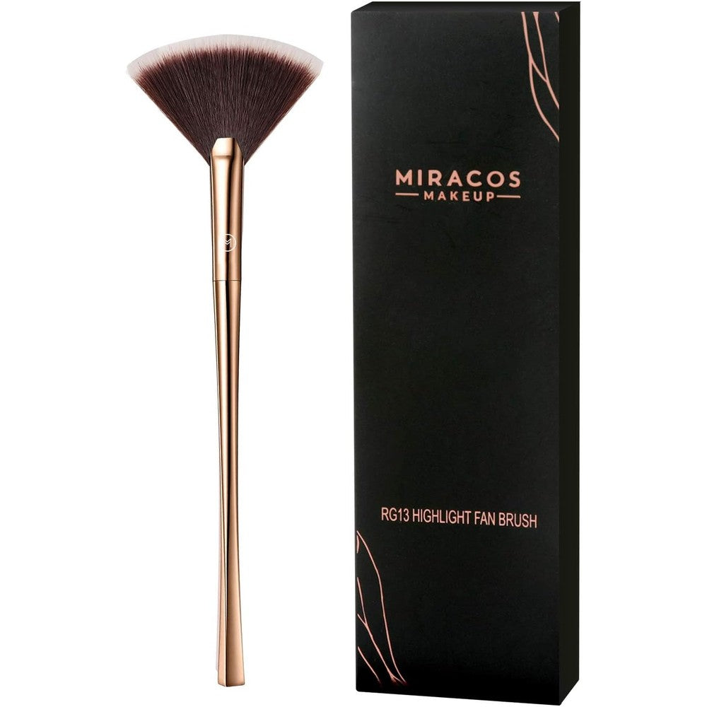 Brush Master Gold Fan Makeup Brush front view showing fluffy synthetic bristles and elegant champagne gold handle.