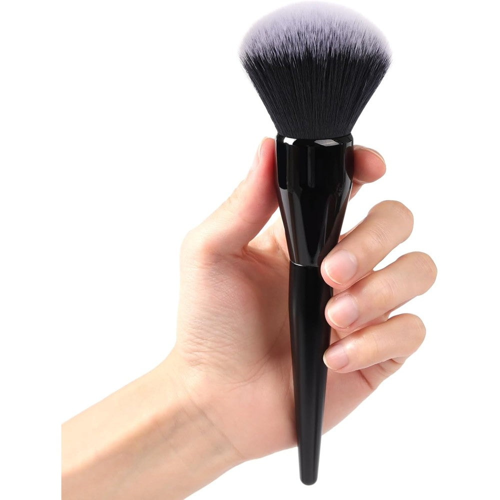 Dpolla large powder brush front view showing the dense rounded black synthetic bristles and sleek handle