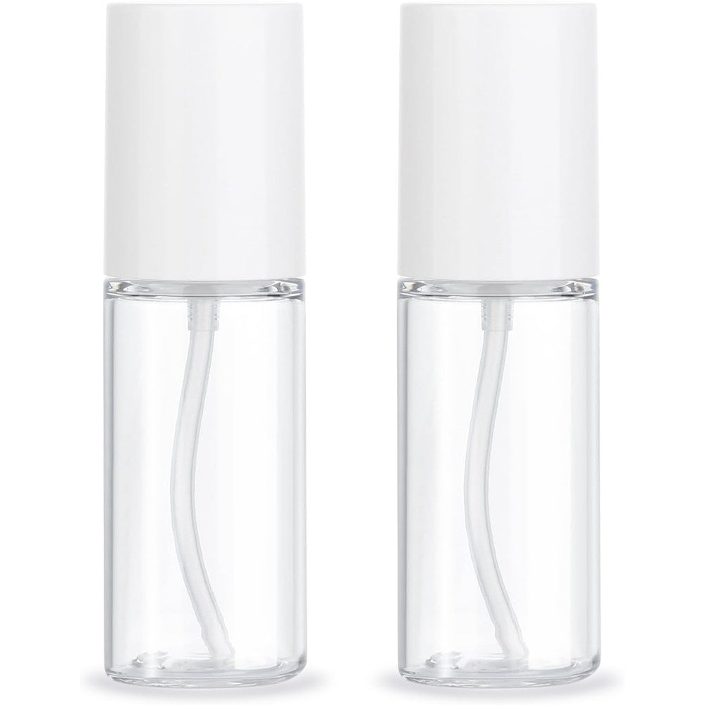 KREMORV travel pump bottle front view of two clear fifty milliliter cosmetic containers