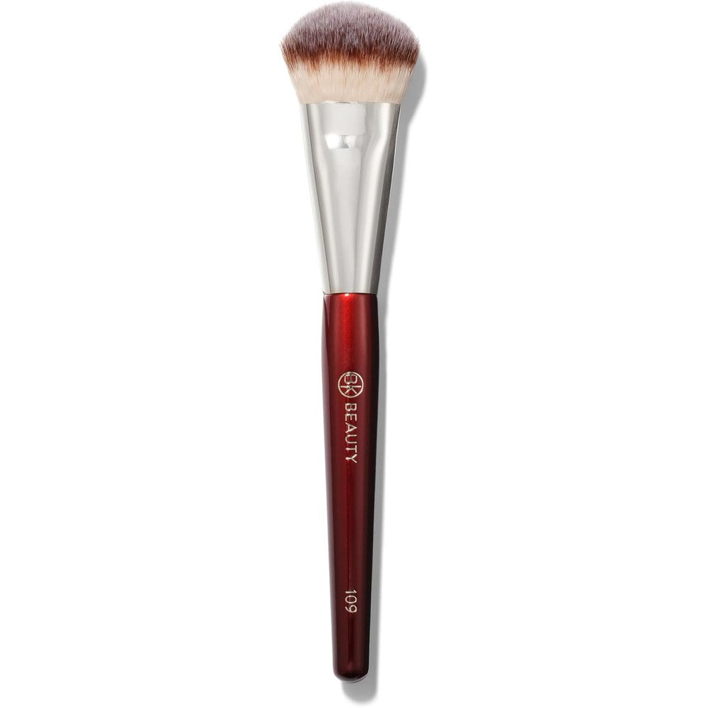 BK Beauty 109 Mini Contoured Foundation Brush front view showing angled synthetic bristles and burgundy handle