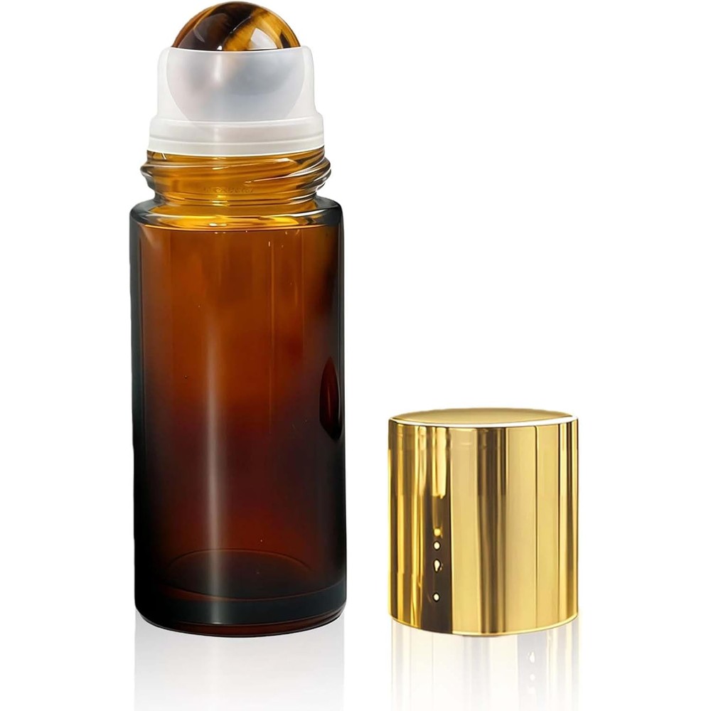 Warmify Tiger's Eye Essential Oil Roller Bottle front view showing the thick amber glass body and premium gold cap design.