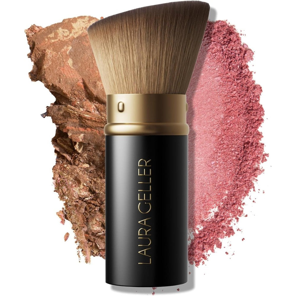 Laura Geller New York Retractable Angled Kabuki Brush front view showing sleek black aluminum case and dense soft bristles.