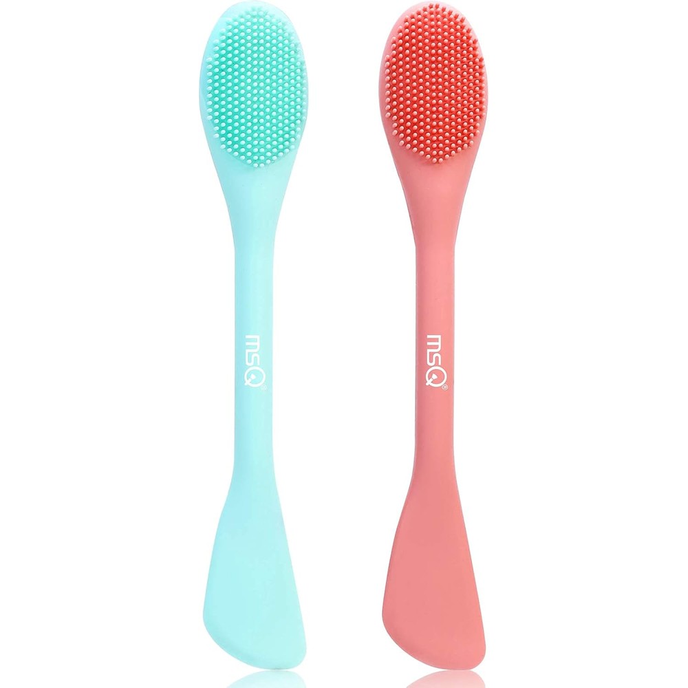 MSQ silicone face mask brush front view showing orange dual ended design