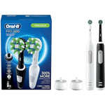 Oral-B Pro 1000 CrossAction Electric Toothbrush front view showcasing black and white handles with chargers.