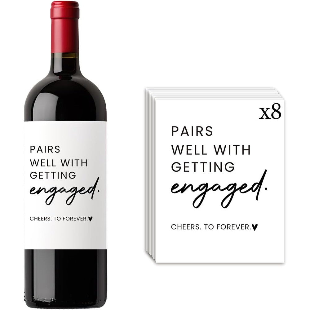 Gejoyse 8 Pieces Engagement Wine Bottle Labels front view showing Pairs Well text on a standard bottle.