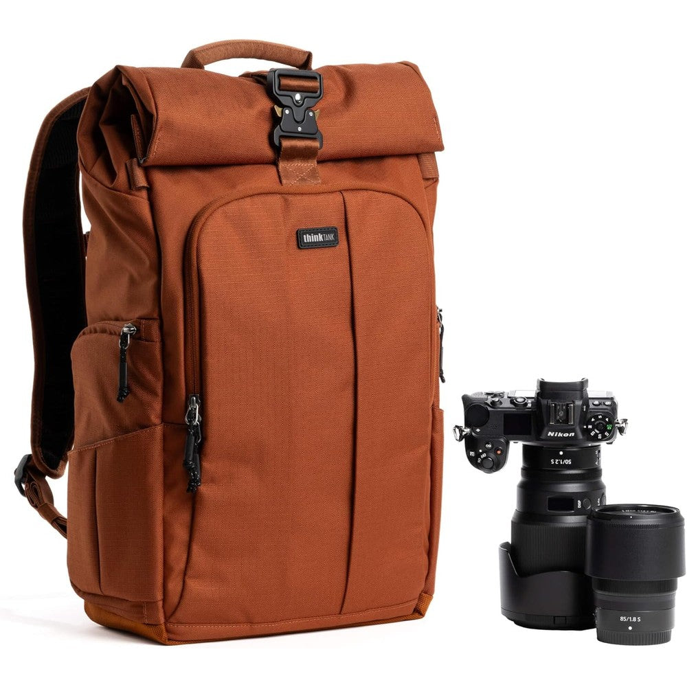 Think Tank FocusPoint 30L RollTop Camera Backpack Urban Rust front view showing magnetic buckle closures