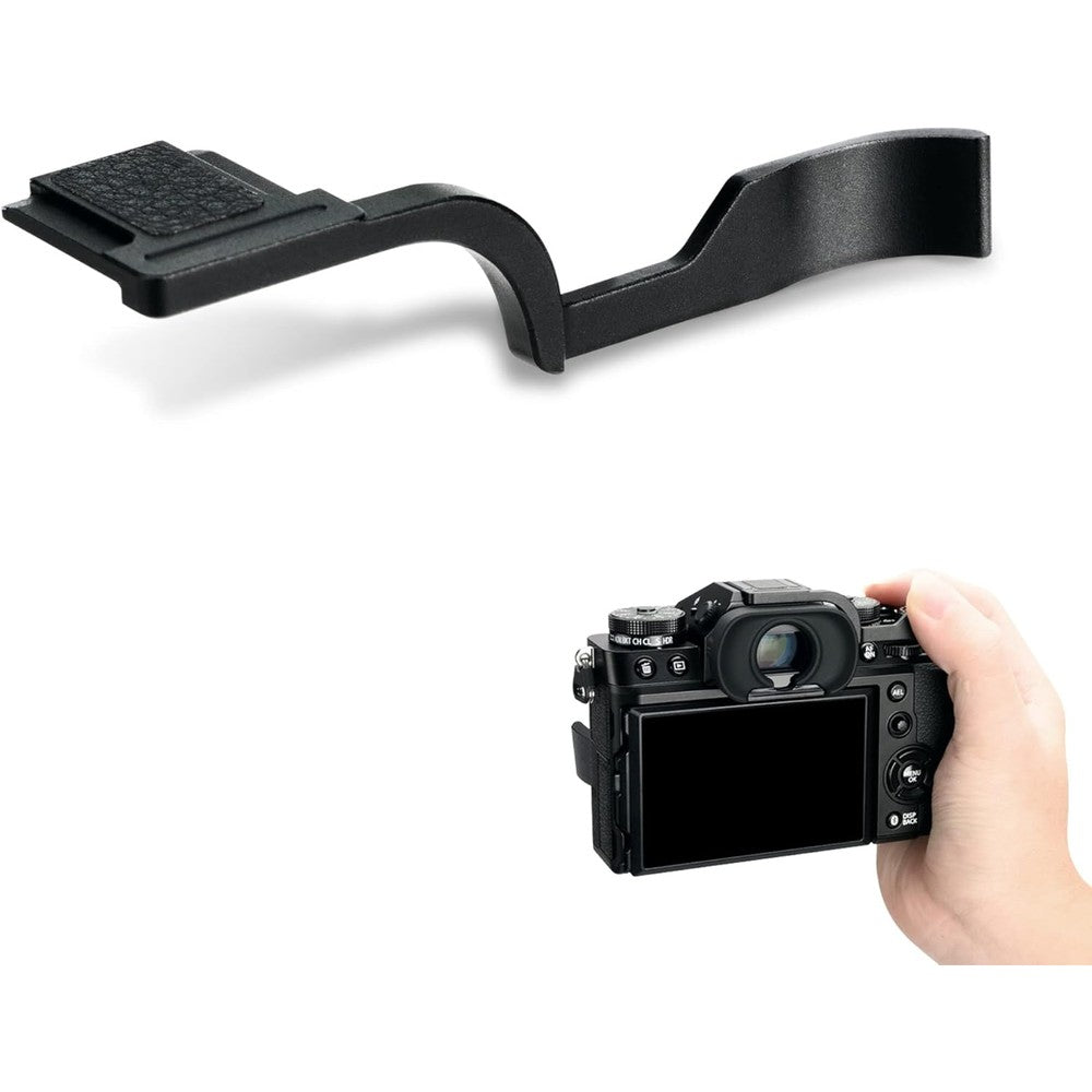 JJC metal thumb up grip front view mounted on a black mirrorless camera hot shoe.