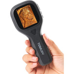 TOMLOV P10 Evo handheld digital coin microscope front view showing the two inch screen displaying a magnified coin