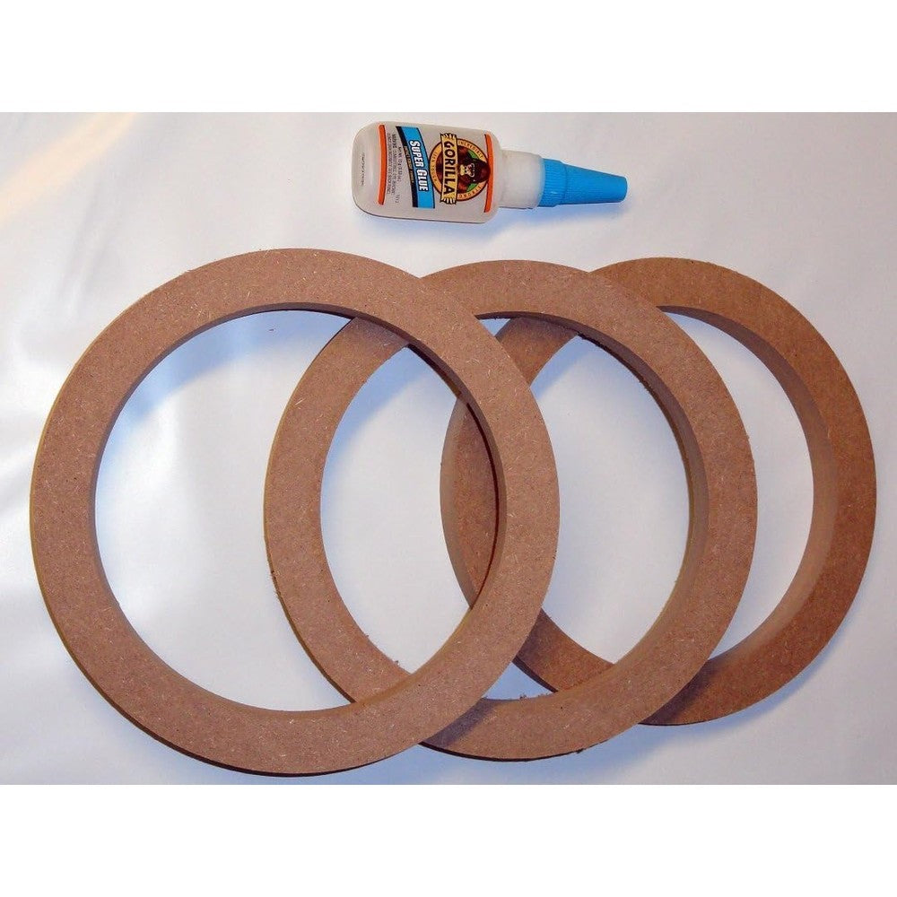 The Electronics PowerHouse 10 inch medium density fiberboard speaker subwoofer spacer rings kit showing three rings and gorilla glue adhesive