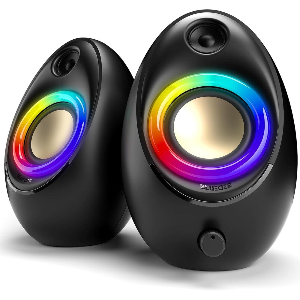 Bluedee computer speakers front view showing compact egg-shaped design and dynamic RGB lighting on a modern desk setup