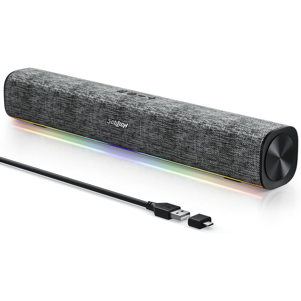 SOULION R100 Bluetooth computer speaker soundbar front view showing grey fabric body and rainbow LED lighting under a monitor.