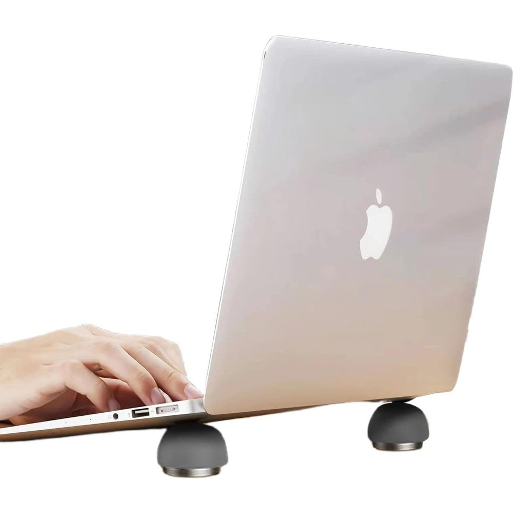 Copora laptop cooling stand front view highlighting the compact magnetic ball design for portable computer elevation.