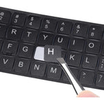 Dammomko universal english keyboard stickers front view showing two sheets of white letters on black background