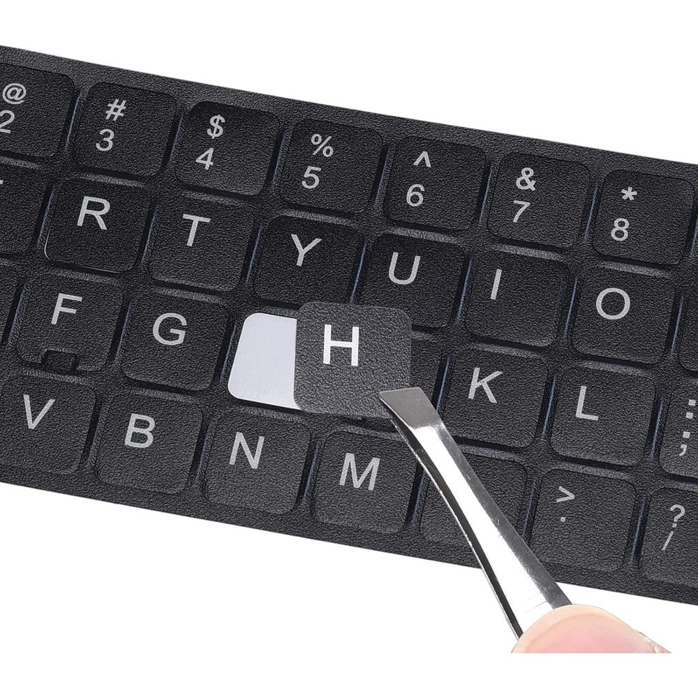 Dammomko universal english keyboard stickers front view showing two sheets of white letters on black background