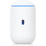 Ubiquiti UniFi Dream Router 7 desktop gateway front view displaying active touchscreen status.