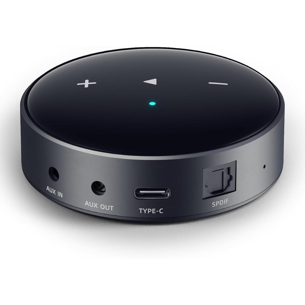 WiiM Mini AirPlay 2 wireless audio streamer front view showcasing sleek black circular design.