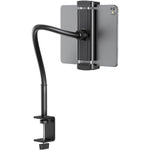 TeQable gooseneck tablet stand front view showing flexible metal arm clamped onto a dark wood office desk holding an iPad pro screen.