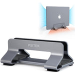 Psitek aluminum vertical laptop stand front view holding a space gray MacBook upright on a minimalist desk setup