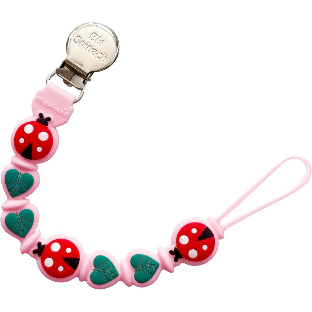 BIGSPINACH silicone pacifier clip front view showing pink ladybug design