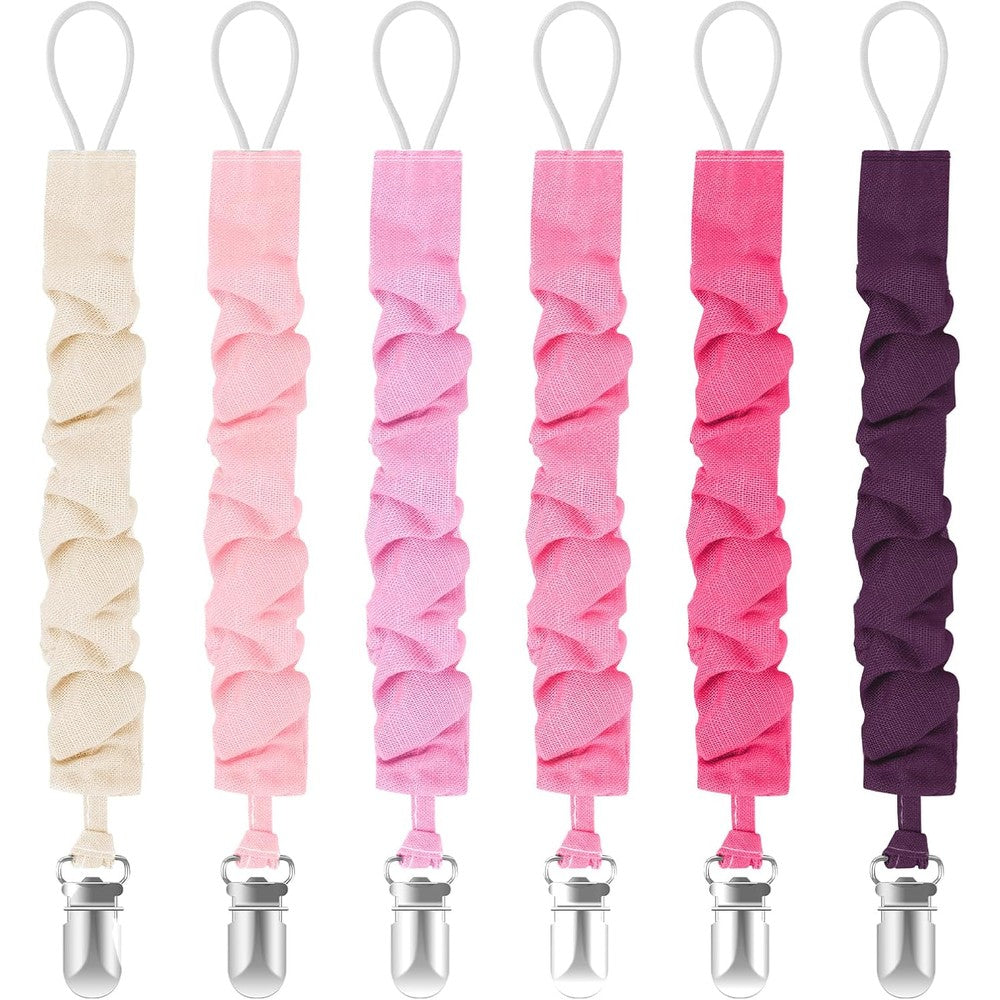 TenderBabe Pacifier Clip front view showing six pack of cotton ruffled binky holders for babies.