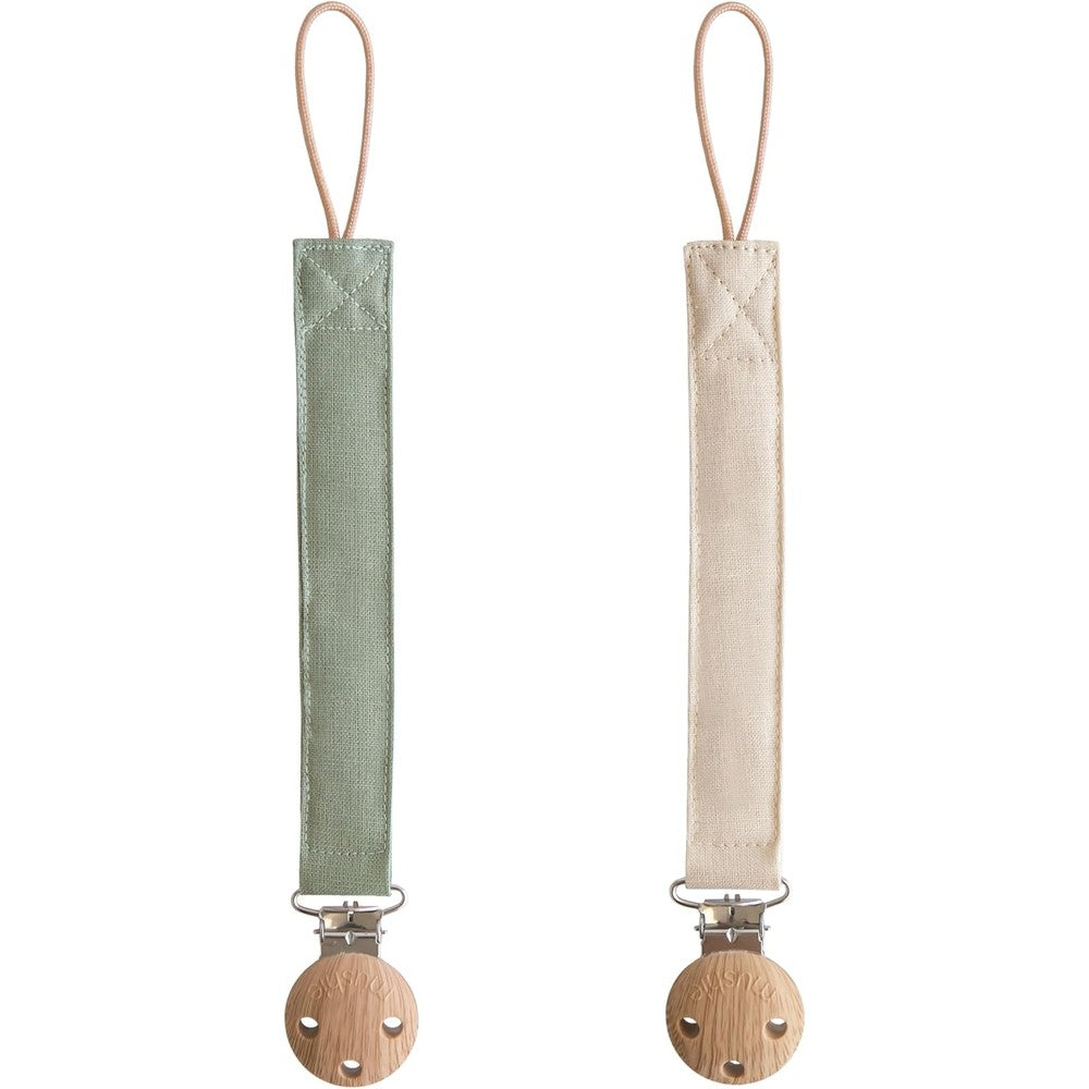 Mushie linen baby pacifier clip holder front view in olive green and shifting sand colors