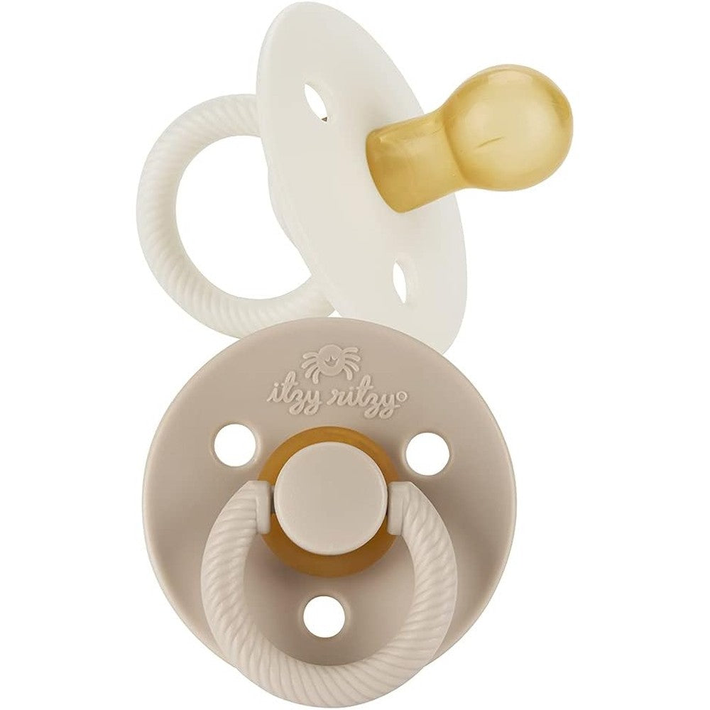 Itzy Ritzy natural rubber newborn pacifier set in coconut and toast colors