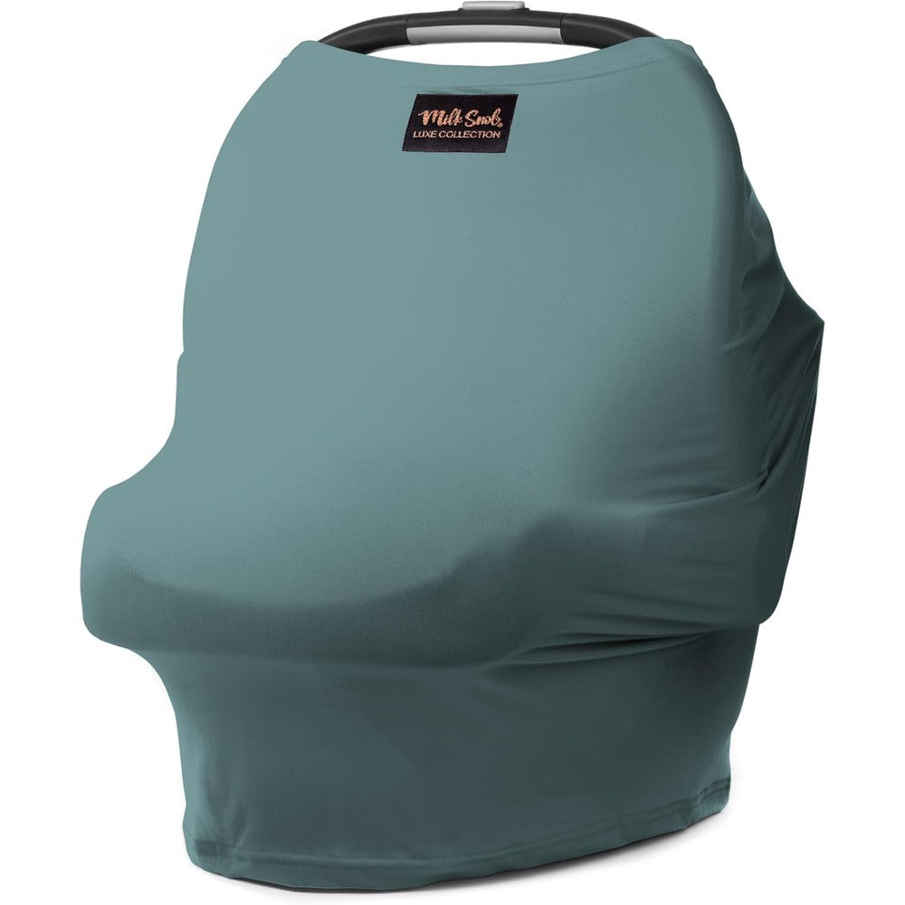 Milk Snob Original Five In One Luxe Cover in Jade front view on an infant car seat.