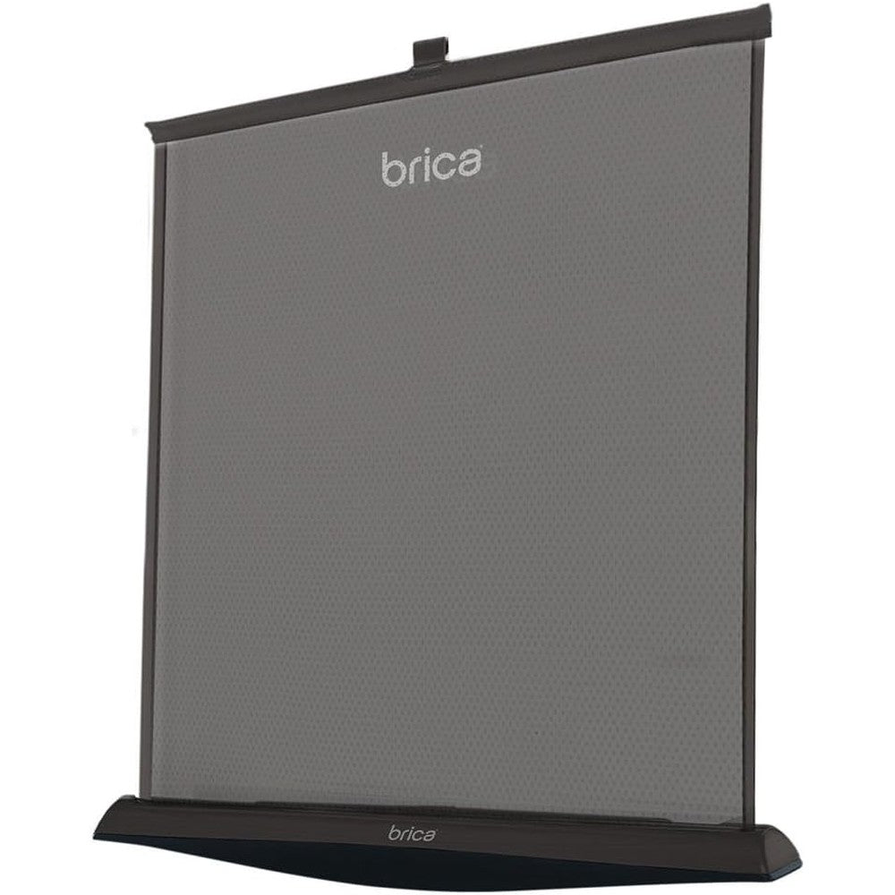 Munchkin Brica Smart Window Shade front view installed on a black car door windowsill blocking sun glare.