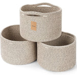 Maxuni small cotton rope storage baskets front view arranged on a wooden closet shelf holding daily home essentials
